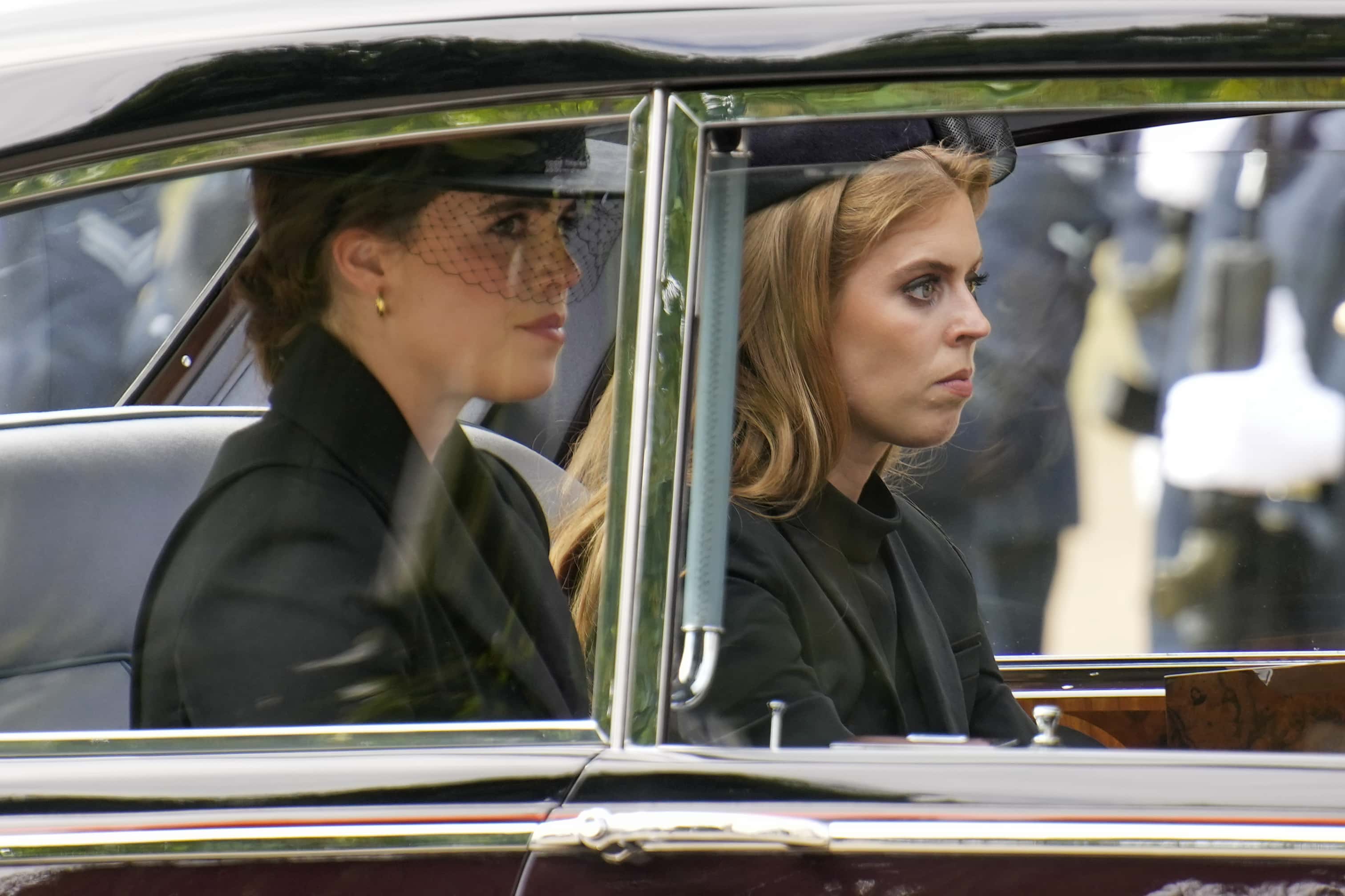 Princess Eugenie and Princess Beatrice are seen in a car following the State Funeral of Queen Elizabeth II at Westminster Abbey on September 19, 2022 in London, England. Elizabeth Alexandra Mary Windsor was born in Bruton Street, Mayfair, London on 21 April 1926. She married Prince Philip in 1947 and ascended the throne of the United Kingdom and Commonwealth on 6 February 1952 after the death of her Father, King George VI. Queen Elizabeth II died at Balmoral Castle in Scotland on September 8, 2022, and is succeeded by her eldest son, King Charles III.