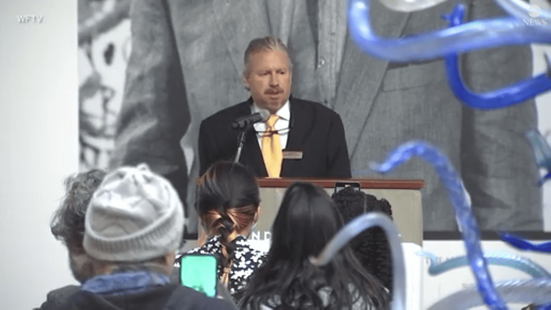 Aaron De Groft has been accused of curating forfeited artworks and making millions from the exhibition at Orlando Museum of Art (ABC News screengrab)