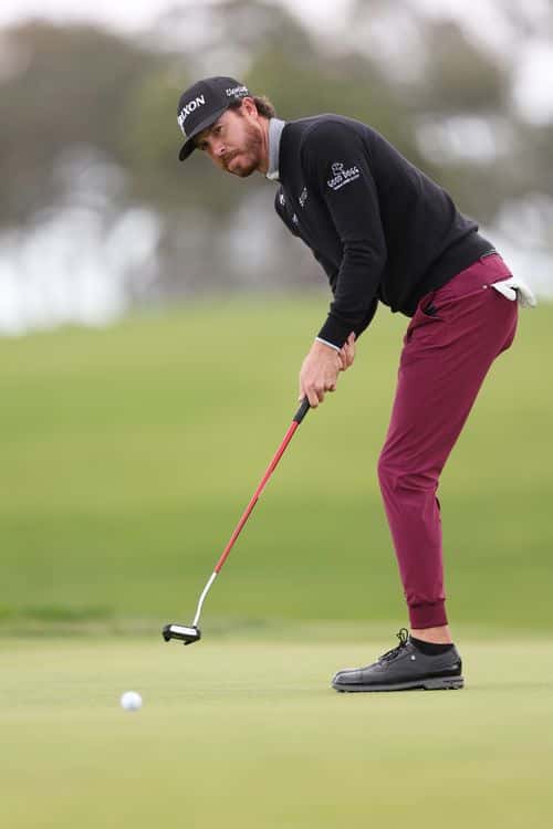 Sam Ryder of the United States putts on the second green during the final round of the Farmers Insurance Open on the South Course of Torrey Pines Golf Course on January 28, 2023 in La Jolla, California.