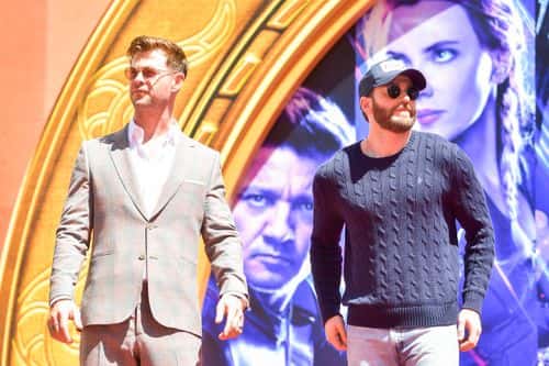 Chris Hemsworth and Chris Evans pose at the Marvel Studios' 'Avengers: Endgame' Cast Place Their Hand Prints In Cement At TCL Chinese Theatre IMAX Forecourt at TCL Chinese Theatre IMAX on April 23, 2019 in Hollywood, California.
