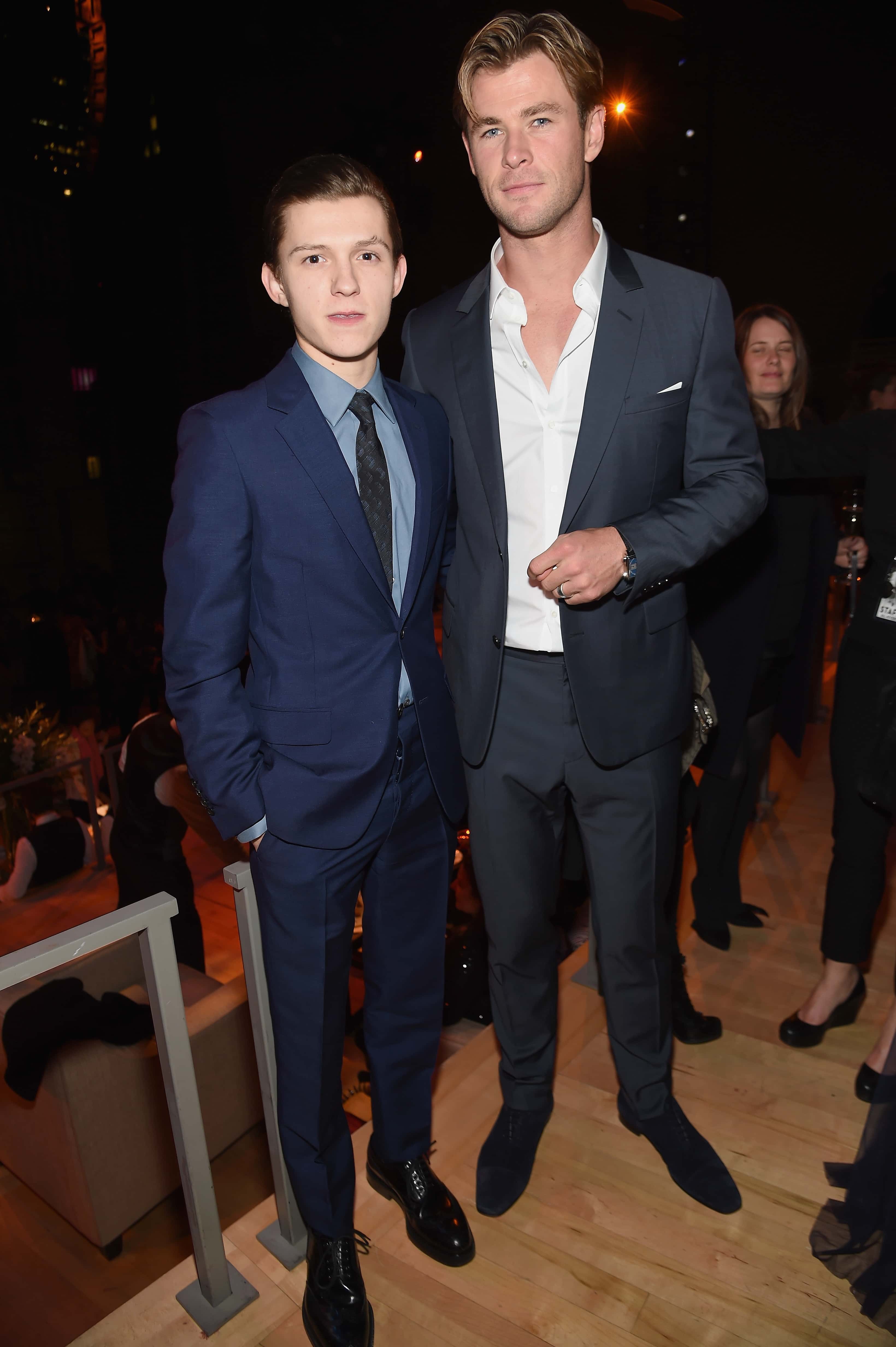 NEW YORK, NY - DECEMBER 07: Tom Holland and Chris Hemsworth attend 