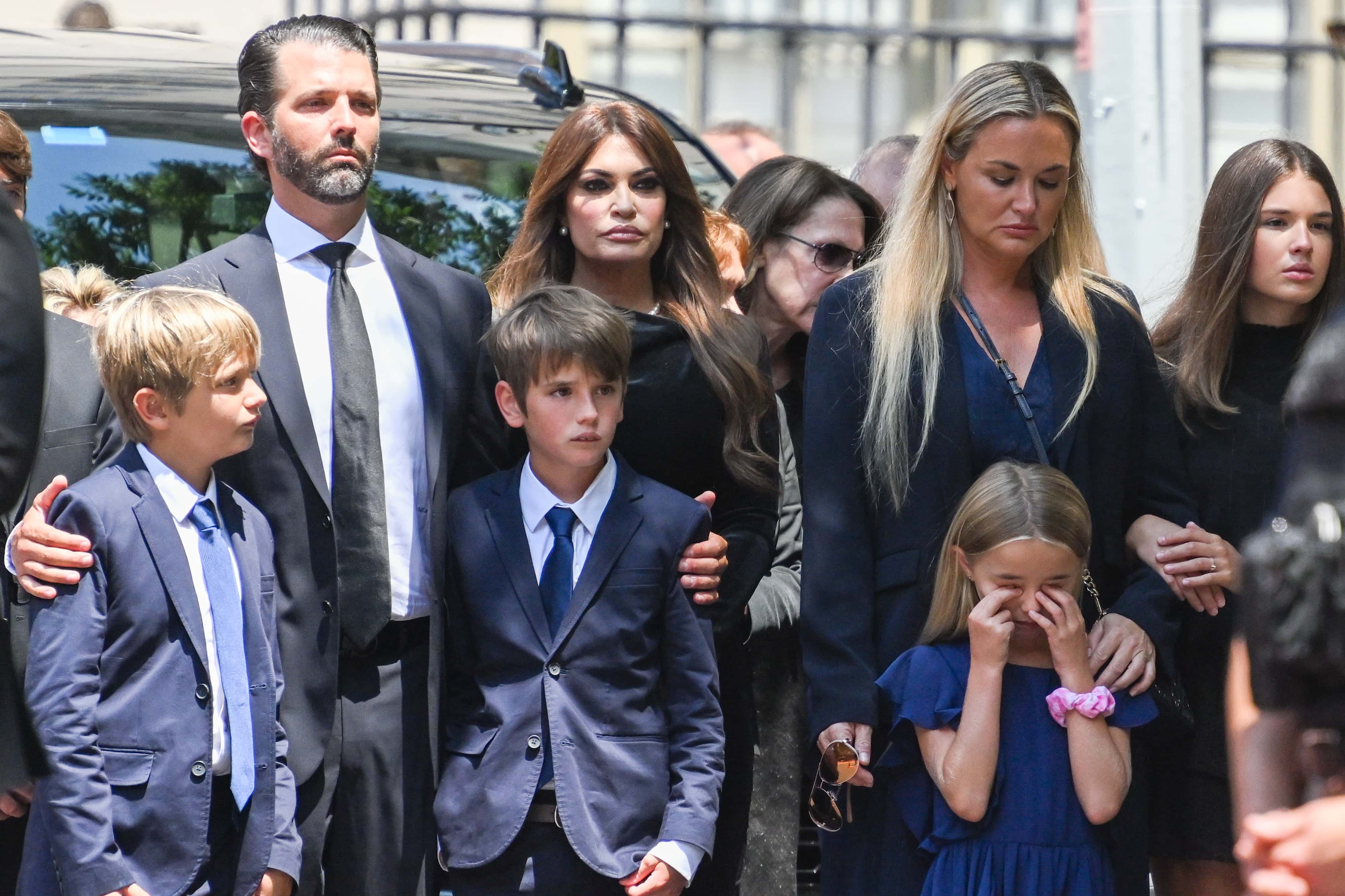 Donald Trump Jr. and Kimberly Guilfoyle arrive for the funeral of Ivana Trump at St. Vincent Ferrer Roman Catholic Church July 20, 2022 in New York City. Trump, the first wife of former U.S. president Donald Trump, died at the age of 73 after a fall down the stairs of her Manhattan home.
