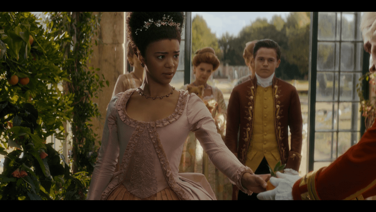 Still from 'Queen Charlotte: A Bridgerton Story' Episode 3 featuring Queen Charlotte and Brimsley