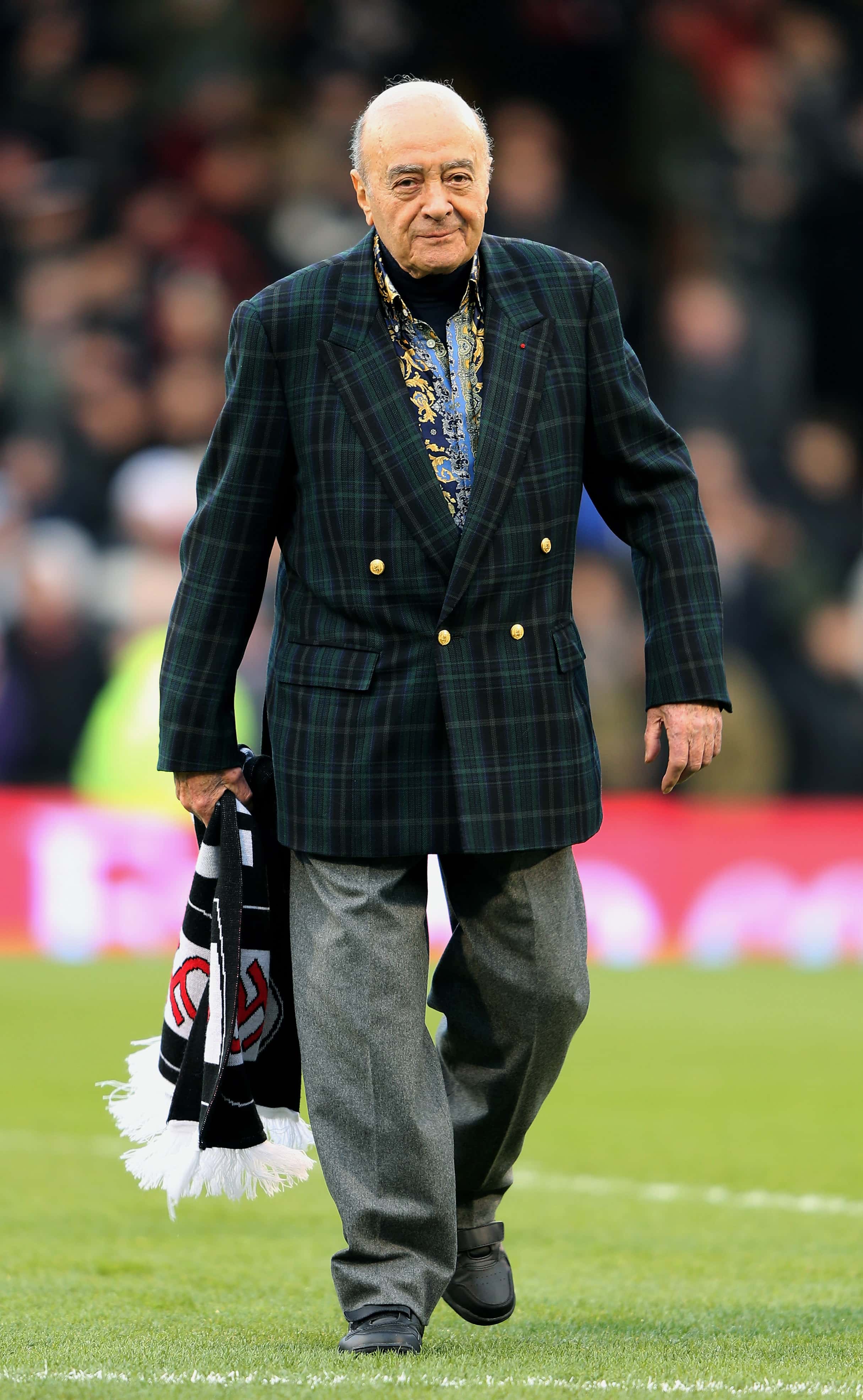 LONDON, ENGLAND - JANUARY 12:  Mohammed Al Fayed the Fulham Chairman walks out onto the pitch prior 