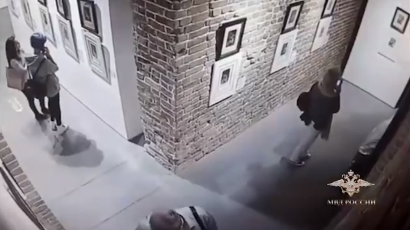 The women wanted to click a photo alongside Francisco Goya's etching and Salvador Dali's interpretation.