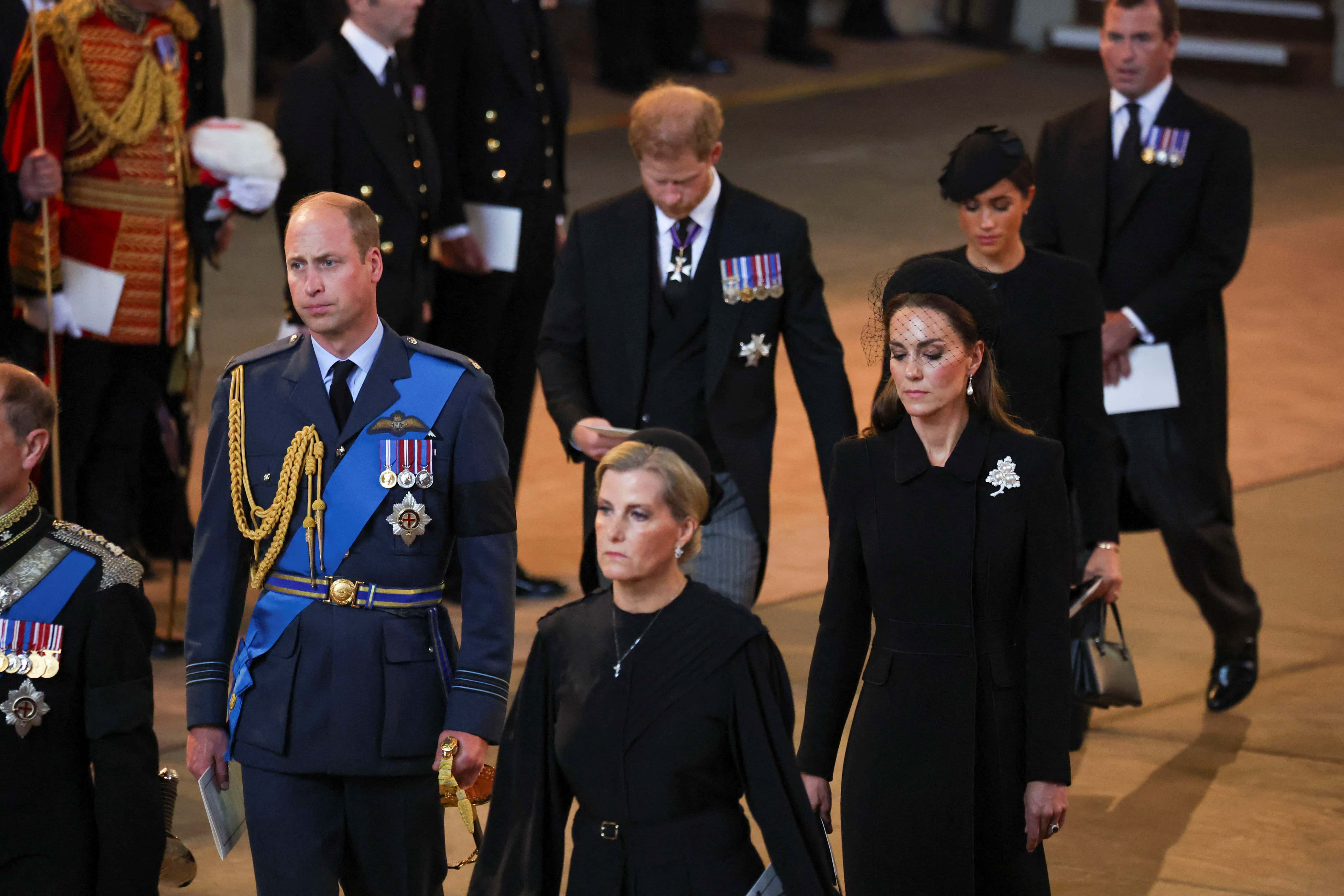 Prince William, Prince of Wales, Sophie, Countess of Wessex, Catherine, Princess of Wales, Prince Harry and Meghan, Duchess of Sussex walk as procession with the coffin of Britain's Queen Elizabeth arrives at Westminster Hall from Buckingham Palace for her lying in state on September 14, 2022 in London, United Kingdom. Queen Elizabeth II's coffin is taken in procession on a Gun Carriage of The King's Troop Royal Horse Artillery from Buckingham Palace to Westminster Hall where she will lay in state until the early morning of her funeral. Queen Elizabeth II died at Balmoral Castle in Scotland on September 8, 2022, and is succeeded by her eldest son, King Charles III.