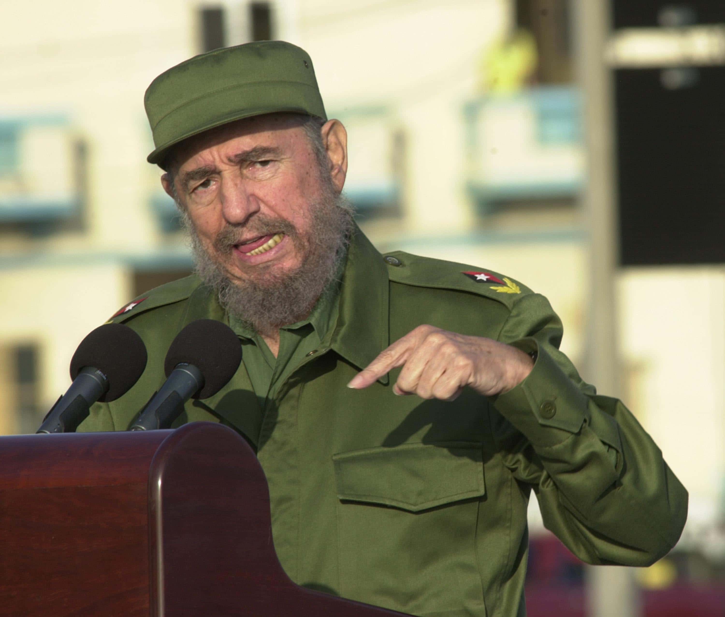 Cuban President Fidel Castro gives a speech in front of the U.S. Interest Section May 14, 2004 in Havana. Castro led a massive protest march against new U.S. moves aimed at speeding the end of his communist rule, and raised the prospect of a feared U.S. invasion.