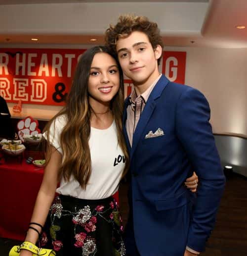 Olivia Rodrigo (L) and Joshua Bassett pose at the after party for the premiere of Disney+'s 