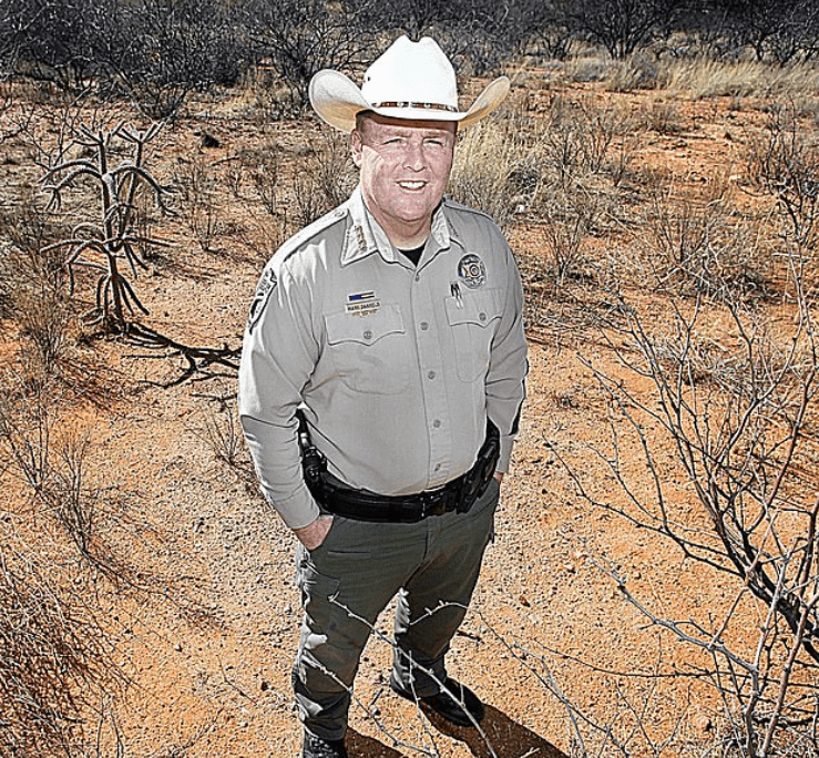 Sheriff Dannels and his wife, Nickie secured the shaken dog in their vehicle after finding it on the I-10 in Arizona (