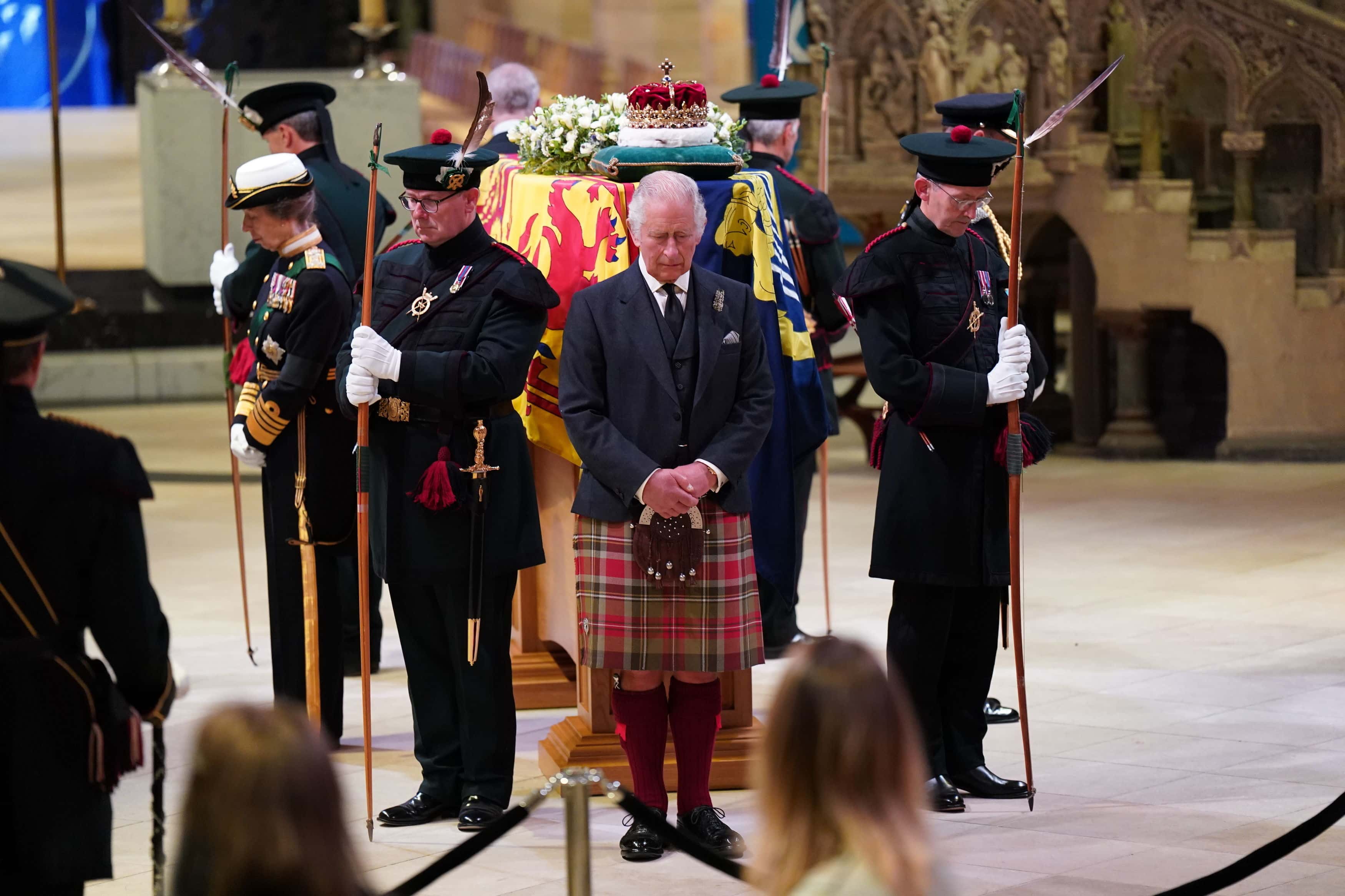 King Charles III, Prince Edward, Duke of Wessex, Princess Anne, Princes Royal and Prince Andrew, Duke of York hold a vigil at St Giles' Cathedral, in honour of Queen Elizabeth II as members of the public walk past on September 12, 2022 in Edinburgh, Scotland. The Queen’s four children attend to stand vigil over her coffin where it lies in rest for 24 hours before being transferred by air to London.