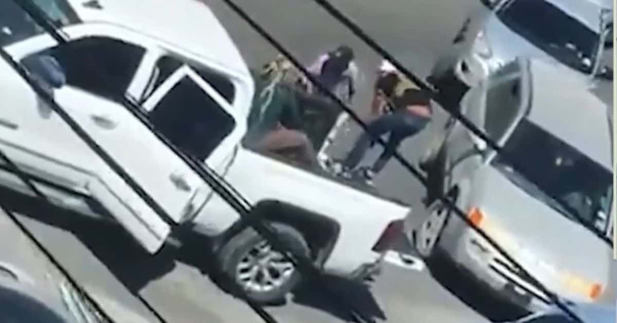 Americans being taken away in the back of the truck by gunmen (CNN Video Screenshot)