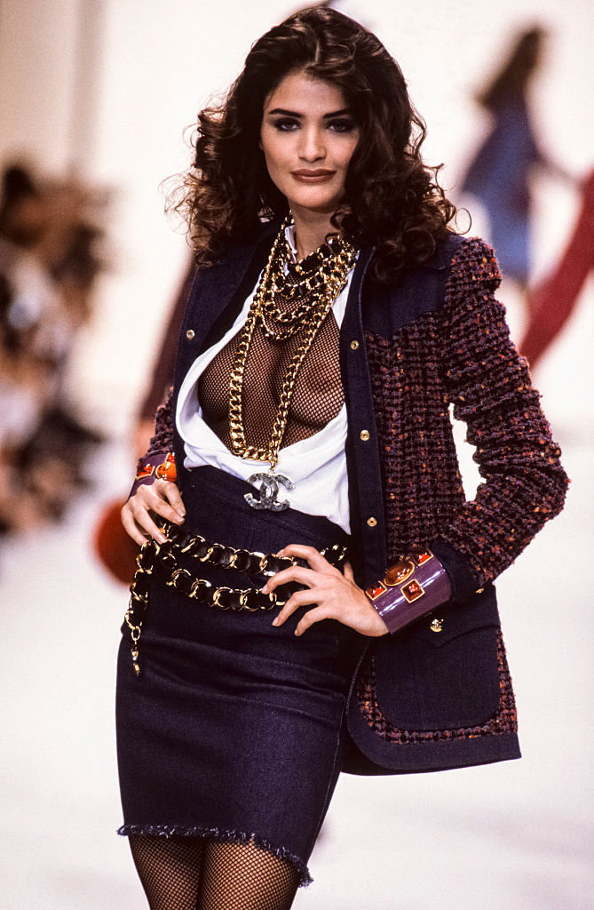  Helena Christensen walks the runway at the Chanel Ready to Wear Fall/Winter 1991-1992 fashion show during the Paris Fashion Week in March, 1991 in Paris, France. (Photo by Victor VIRGILE/Gamma-Rapho via Getty Images)