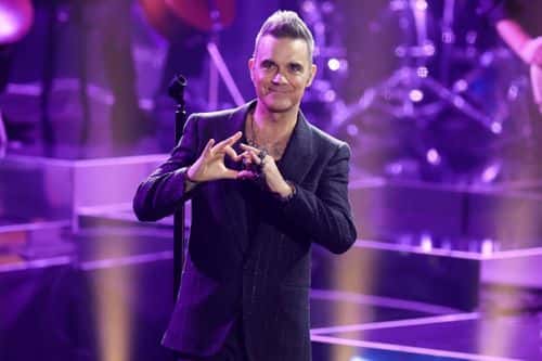 Robbie Williams performs on stage during the 