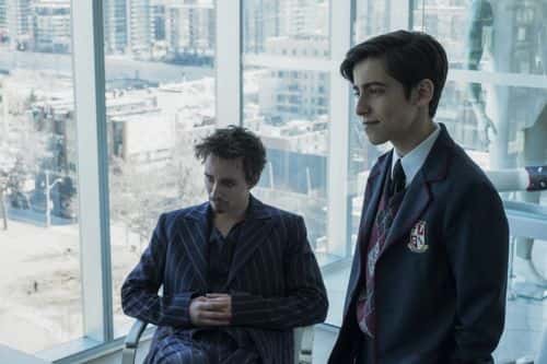 Robert Sheehan as Klaus Hargreeves and Aidan Gallagher as Number Five in Season 1, Episode 2 of 'The Umbrella Academy' 'Run Boy Run' (IMDb)