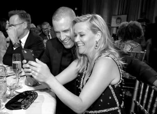 (EDITORS NOTE: Image has been converted to black and white.)  Jim Toth (L) and actor Reese Witherspoon attend The 23rd Annual Critics' Choice Awards at Barker Hangar on January 11, 2018 in Santa Monica, California.
