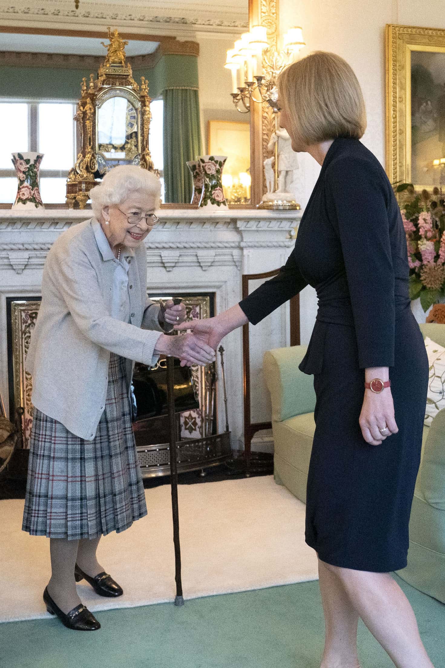 Queen Elizabeth greets newly elected leader of the Conservative party Liz Truss as she arrives at Balmoral Castle for an audience where she will be invited to become Prime Minister and form a new government on September 6, 2022 in Aberdeen, Scotland. The Queen broke with the tradition of meeting the new prime minister and Buckingham Palace, after needing to remain at Balmoral Castle due to mobility issues.