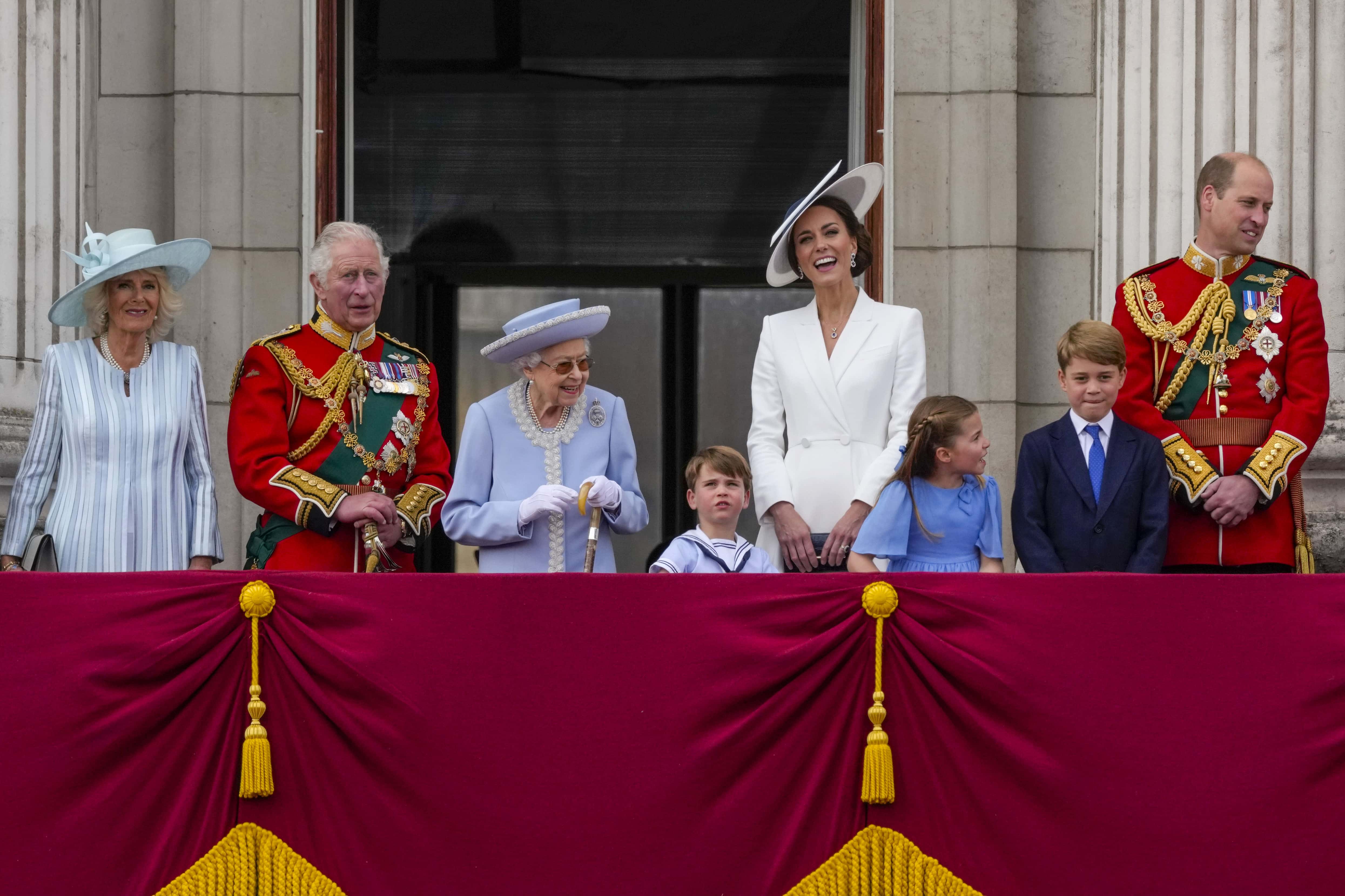 (L-R) Camilla, Duchess of Cornwall, Prince Charles, Prince of Wales, Queen Elizabeth II, Prince Louis of Cambridge, Catherine, Duchess of Cambridge, Princess Charlotte of Cambridge, Prince George of Cambridge and Prince William, Duke of Cambridge on the balcony of Buckingham Palace watch the RAF flypast during the Trooping the Colour parade on June 2, 2022 in London, England. Trooping The Colour, also known as The Queen's Birthday Parade, is a military ceremony performed by regiments of the British Army that has taken place since the mid-17th century. It marks the official birthday of the British Sovereign. This year, from June 2 to June 5, 2022, there is the added celebration of the Platinum Jubilee of Elizabeth II  in the UK and Commonwealth to mark the 70th anniversary of her accession to the throne on 6 February 1952.