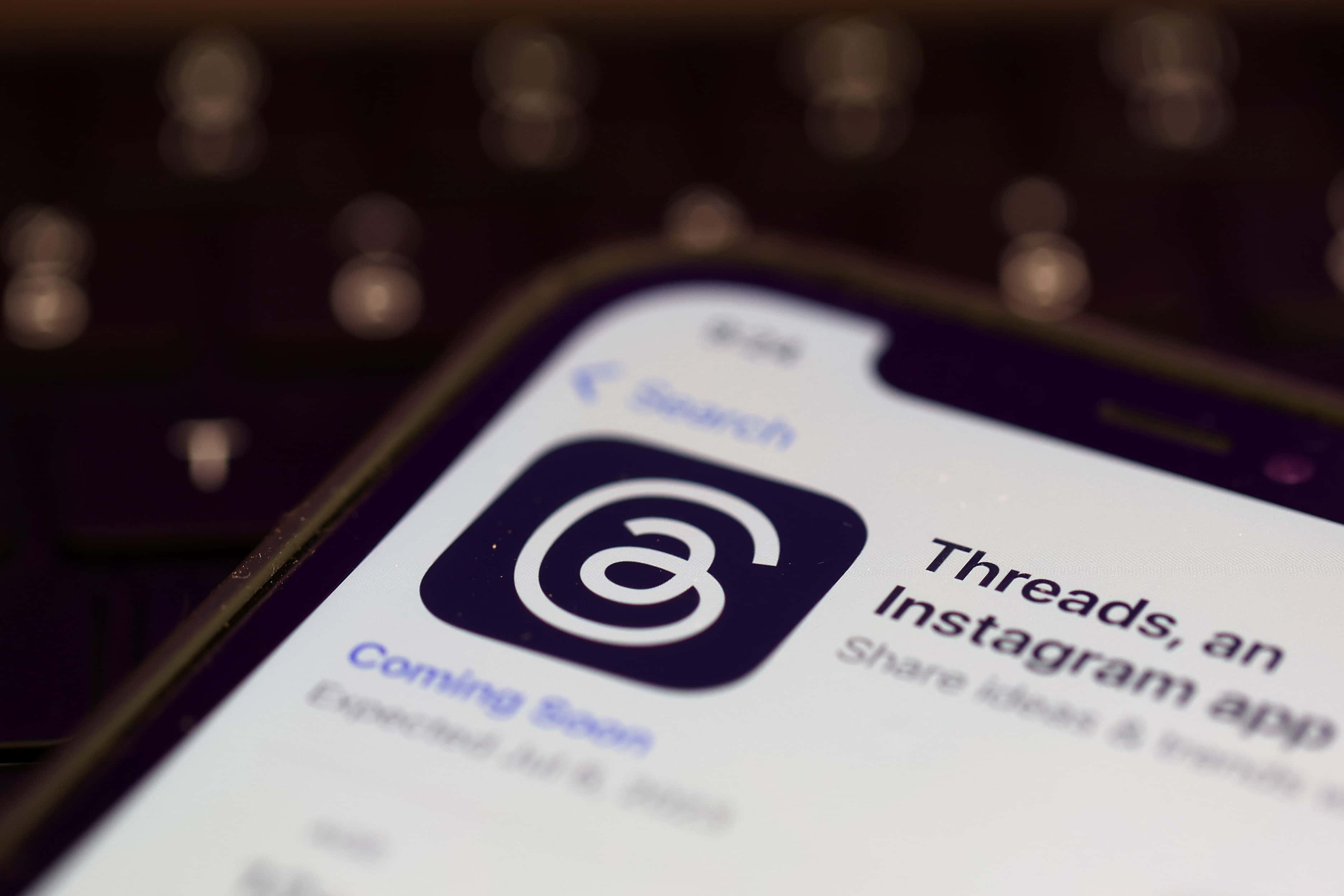 SAN ANSELMO, CALIFORNIA - JULY 05: In this photo illustration, the Threads logo is displayed on a cell phone on July 05, 2023 in San Anselmo, California. Instagram parent company Meta is set to release Threads on July 6, a potential rival to Twitter, the fledgling social media app run by Tesla CEO Elon Musk. (Photo Illustration by Justin Sullivan/Getty Images)