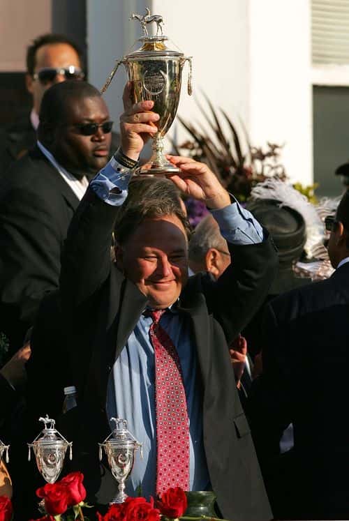 Rick Dutrow, trainer for Big Brown, celebrates with the trophy after Big Brown won the 134th running of the Kentucky Derby on May 3, 2008 at Churchill Downs in Louisville, Kentucky.
