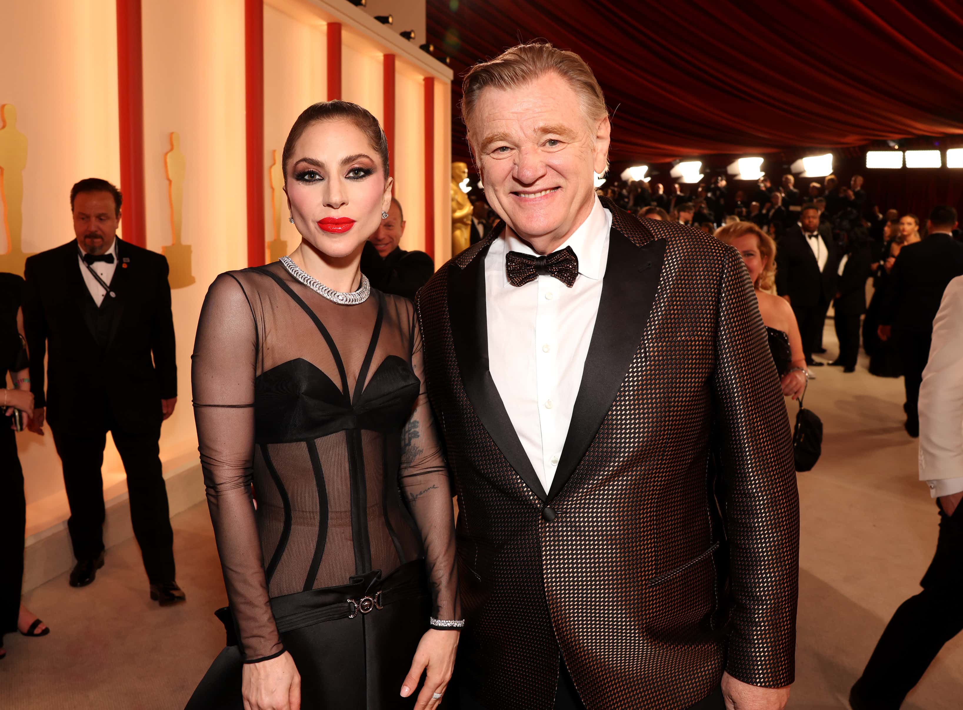Lady Gaga and Brendan Gleeson attend the 95th Annual Academy Awards on March 12, 2023 in Hollywood, California.