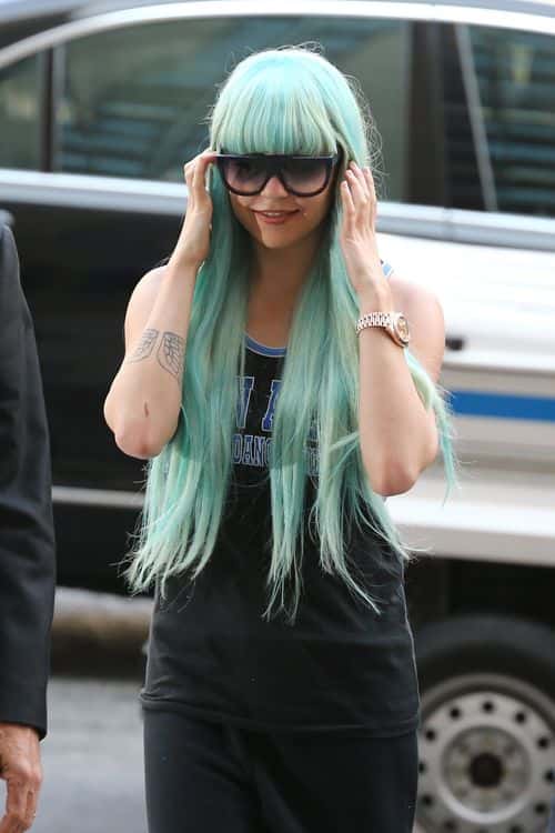 Amanda Bynes attends an appearance at Manhattan Criminal Court on July 9, 2013 in New York City. Bynes is facing charges of reckless endangerment, tampering with evidence and criminal possession of marijuana in relation to her arrest on May 23, 2013.
