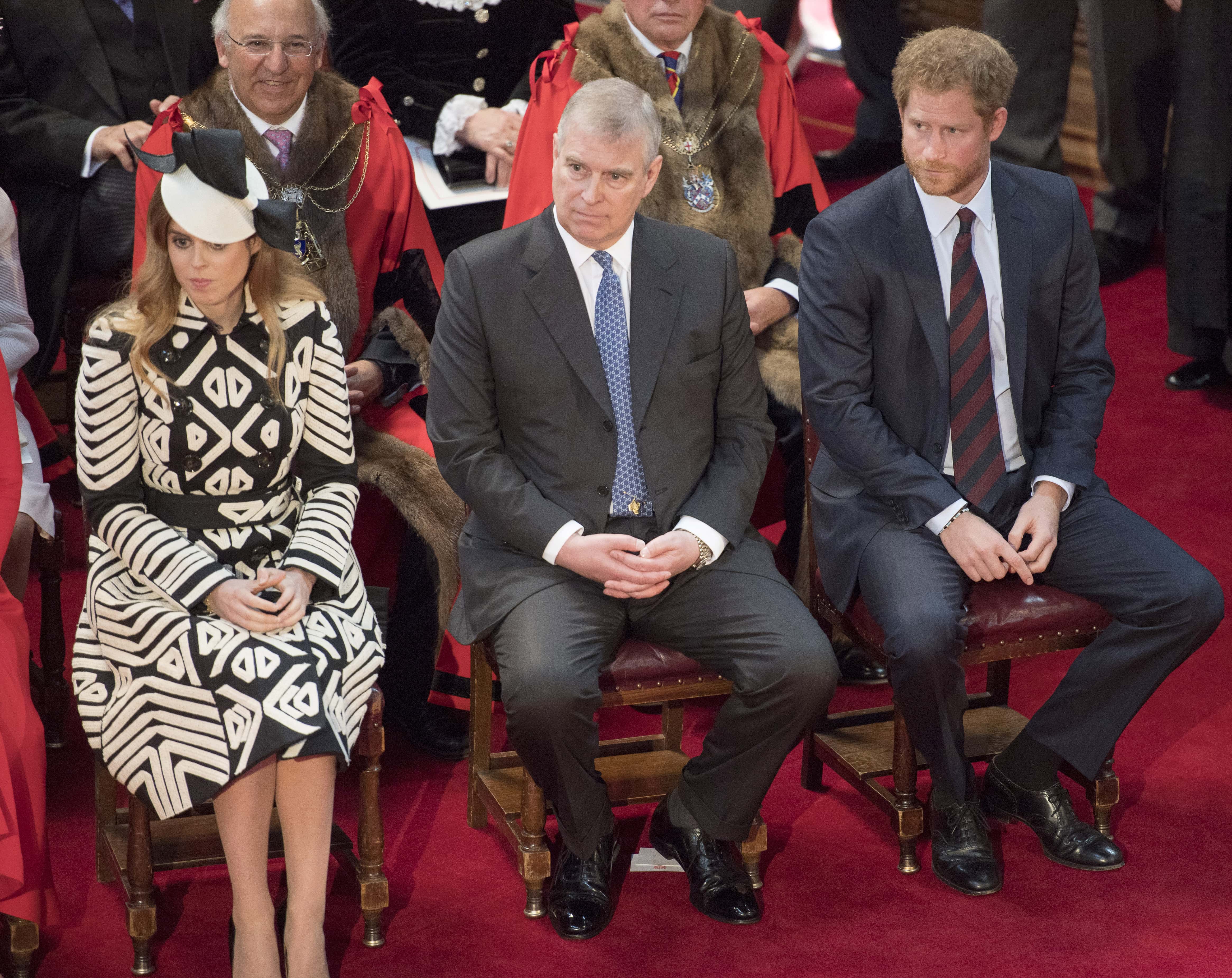 (L-R) Princess Beatrice, Prince Andrew, Duke of York and Prince Harry attend a lunch after the National Service of Thanksgiving as part of the 90th birthday celebrations for The Queen at The Guildhall on June 10, 2016 in London, England.