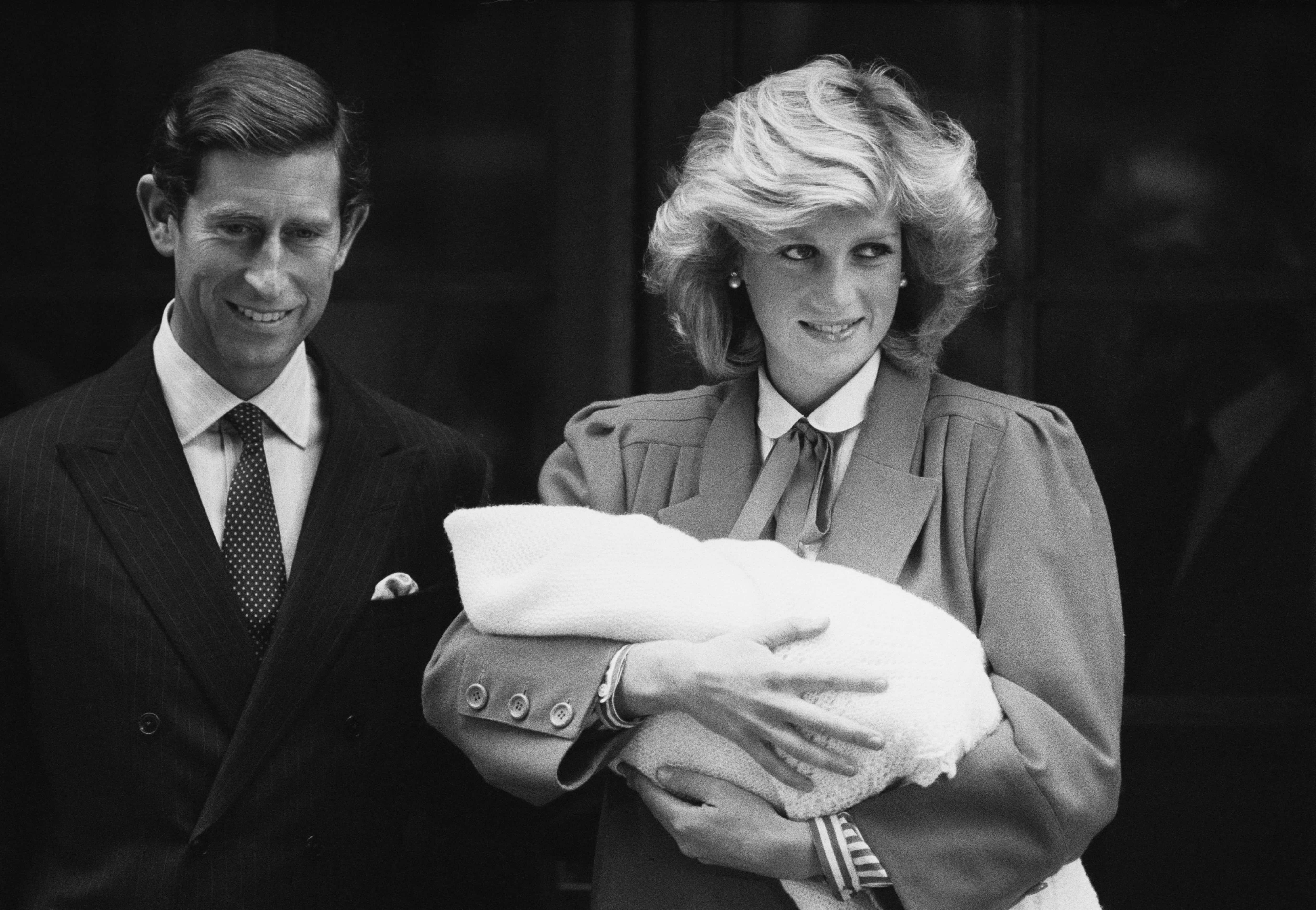 Diana Princess of Wales (1961 - 1997) and Prince Charles with newborn Prince Harry, leave St Mary's Hospital in Paddington, London, UK, 16th September 1984; Diana wore an outfit designed by Jan Van Velden. (Photo by Steve Wood/Daily Express/Hulton Archive/Getty Images)