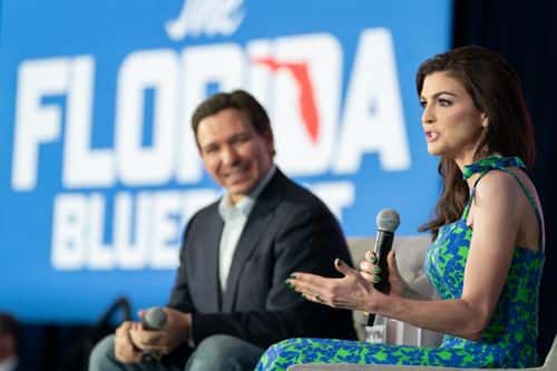 Florida Governor Ron DeSantis, left, and his wife, Casey DeSantis, speak to a crowd at the North Charleston Coliseum on April 19, 2023 in North Charleston, South Carolina. The Governor's appearance marks his first official visit to the 