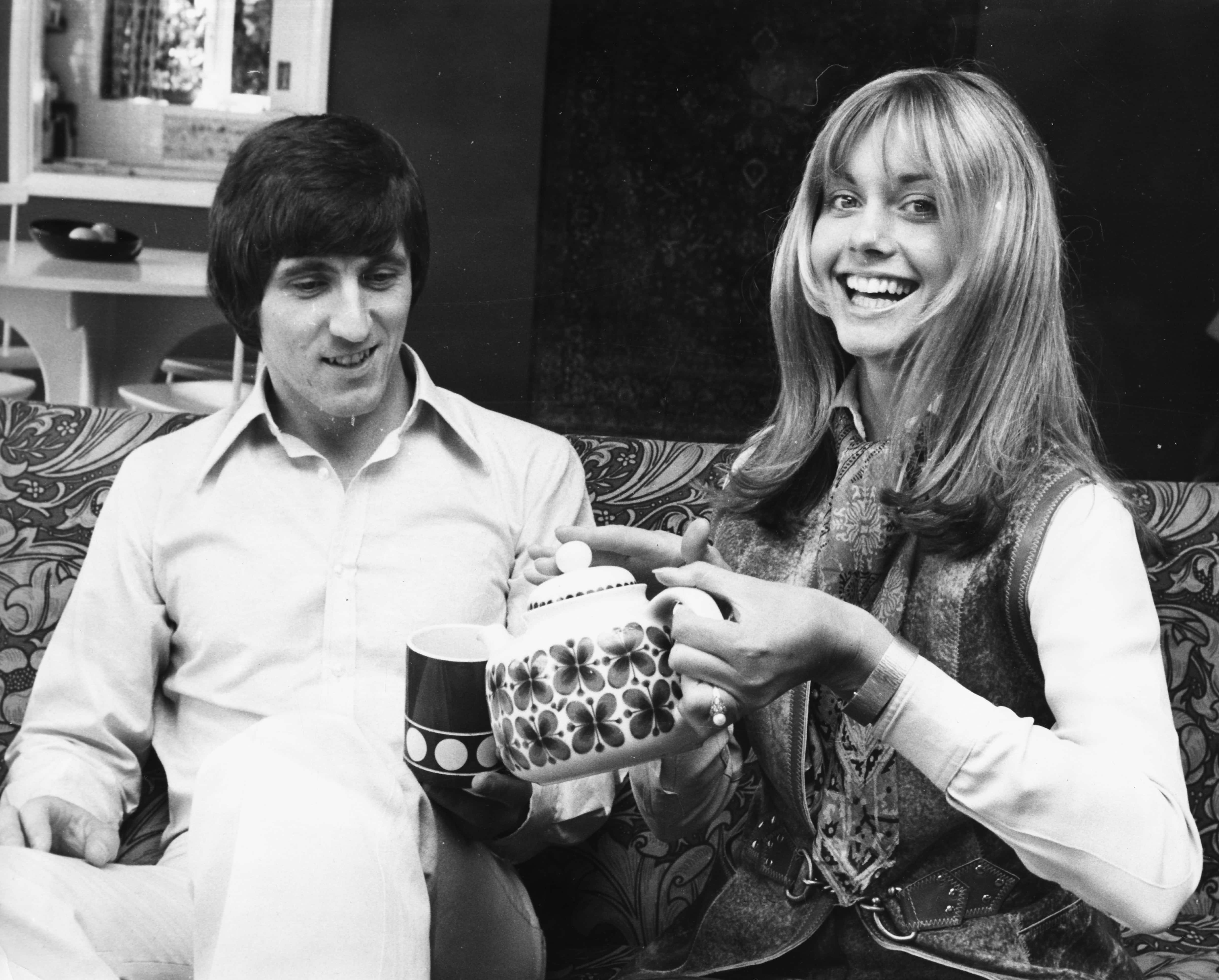 English-Australian singer, Olivia Newton-John with her fiance, guitarist Bruce Welch of The Shadows, at their home in Hadley Common, Hertforshire, June 1970. Newton-John is about to join the group Toomorrow. (Photo by Chris Ware/Keystone Features/Hulton Archive/Getty Images)