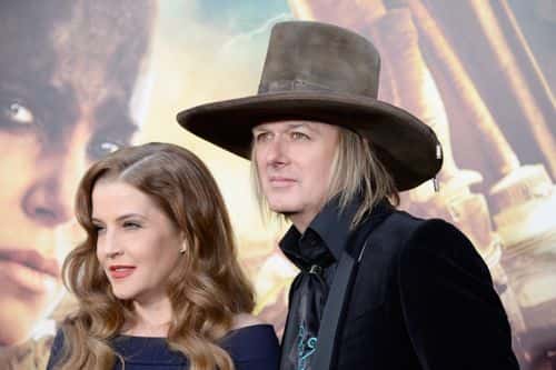 Singer Lisa Marie Presley (L) and musician Michael Lockwood attend the premiere of Warner Bros. Pictures'