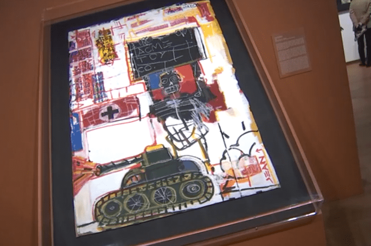 25 never-before-seen artworks displayed at the exhibition curated by Aaron De Groft were labeled forfeited pieces (ABC News screengrab)