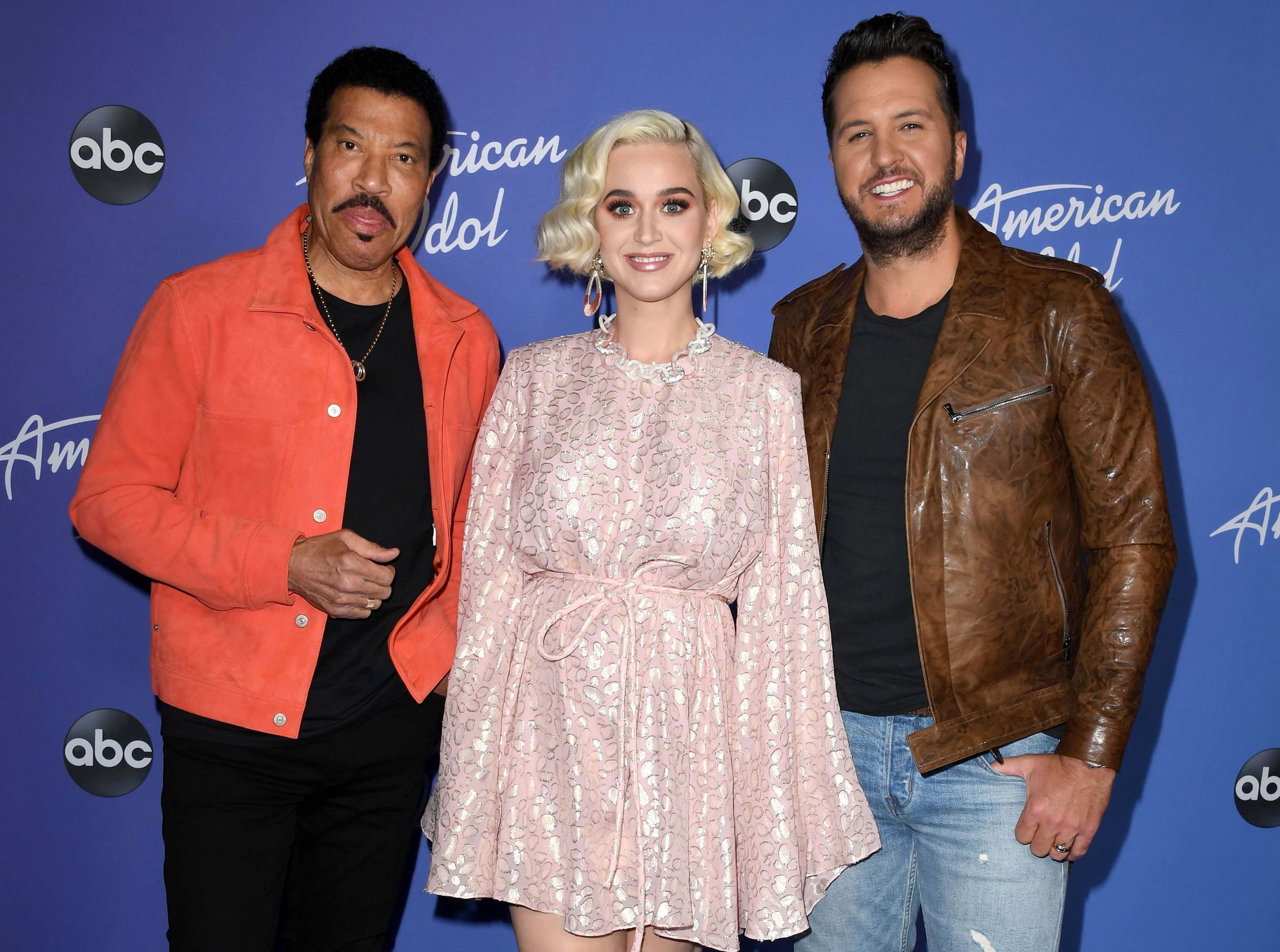 (L-R) Lionel Richie, Katy Perry and Luke Bryan attend the premiere event for 