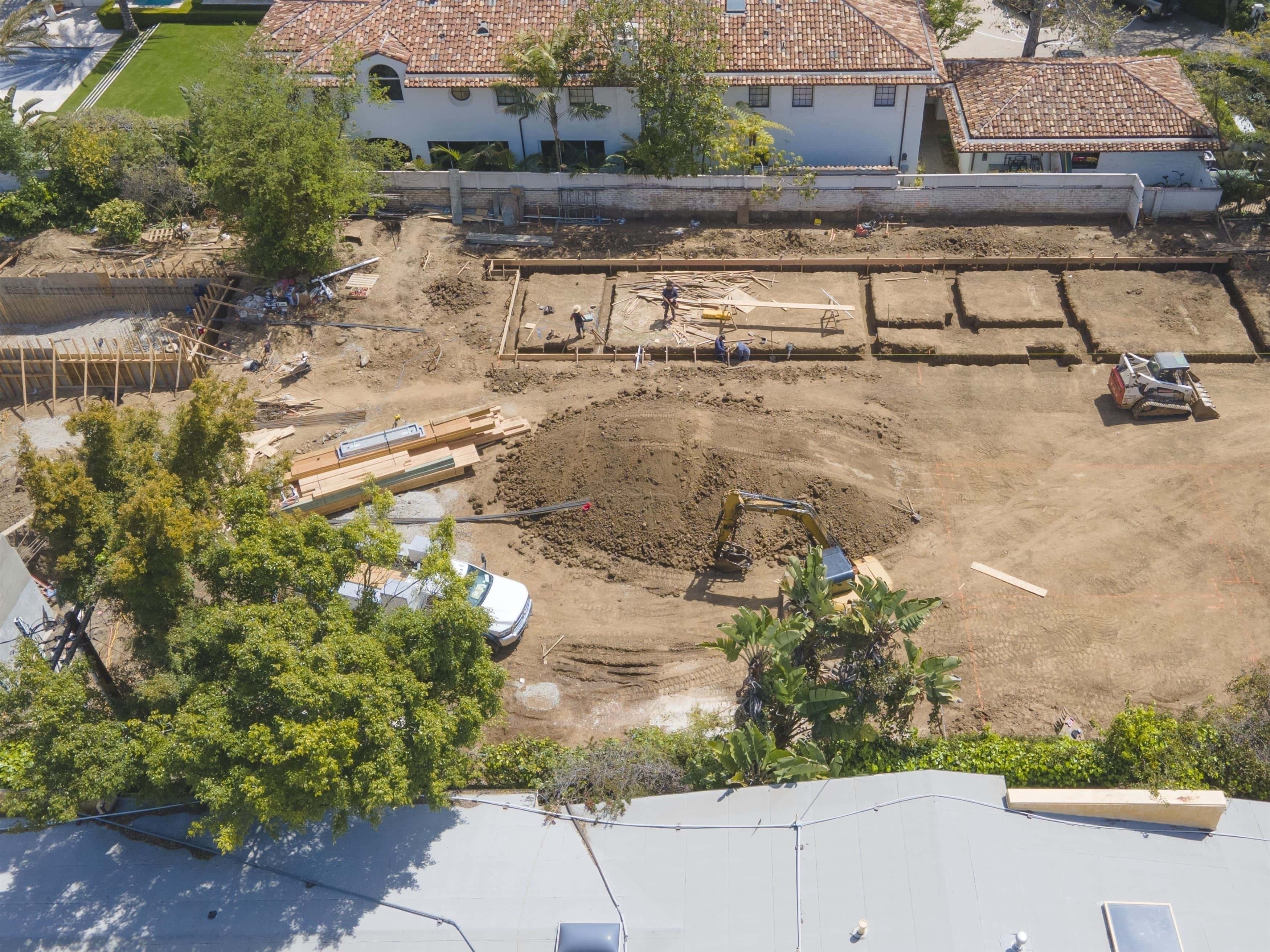 In new images, the home where White lived for decades could be seen as nothing but dirt. (Backgrid)