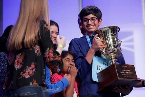 Karthik Nemmani (R) is surrounded by family and friends after he correctly spelled the word 'koinonia' to win the 91st Scripps National Spelling Bee at the Gaylord National Resort and Convention Center May 31, 2018 in National Harbor, Maryland. Forty one finalists were selected to participate in the final day after a record 516 spellers were officially invited, up from 291 in 2017 .