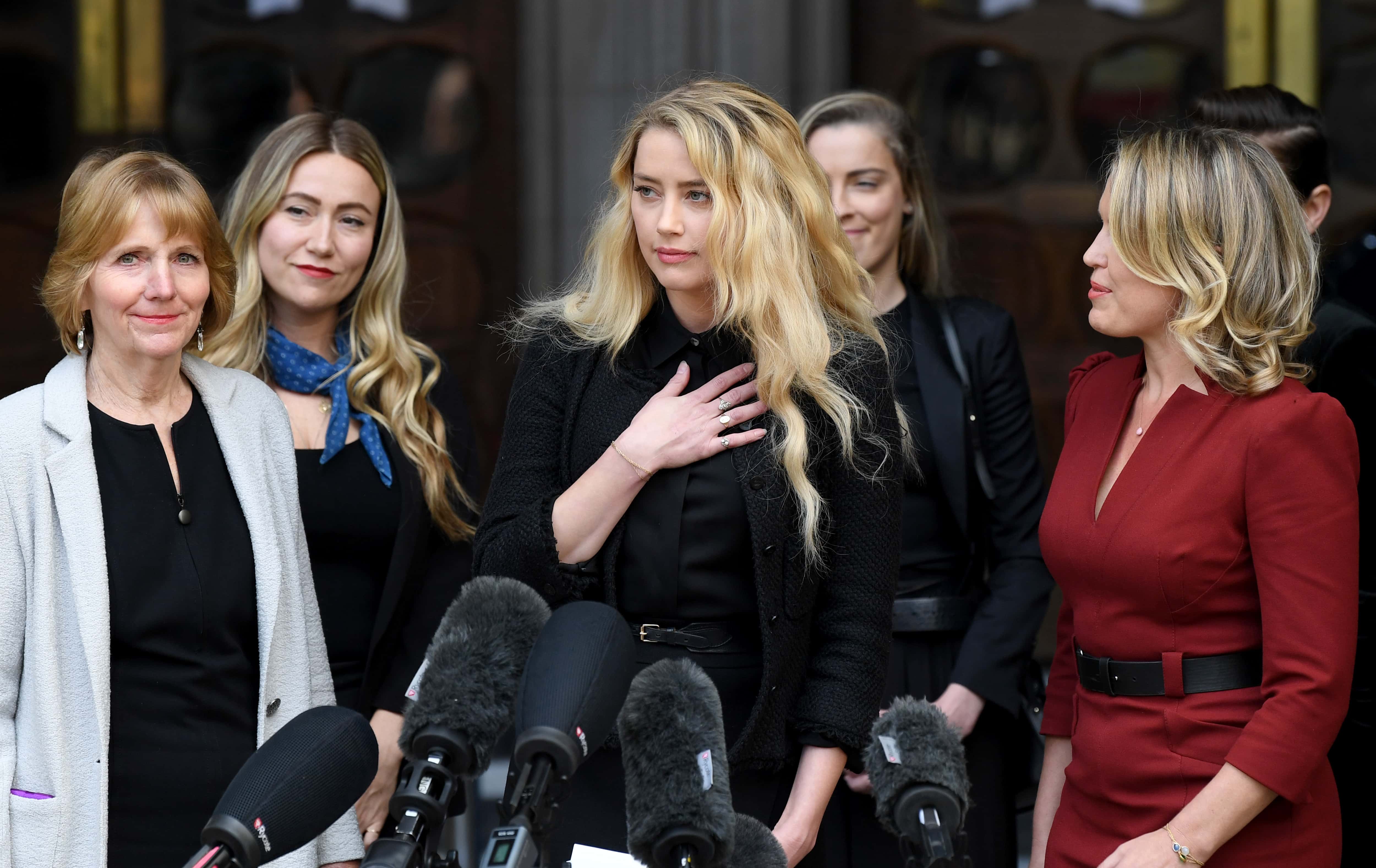 LONDON, ENGLAND - JULY 28: Amber Heard speaks outside the Royal Courts of Justice, the Strand on July 28, 2020 in London, England. The Hollywood actor is suing News Group Newspapers (NGN) and the Sun's executive editor, Dan Wootton, over an article published in 2018 that referred to him as a 