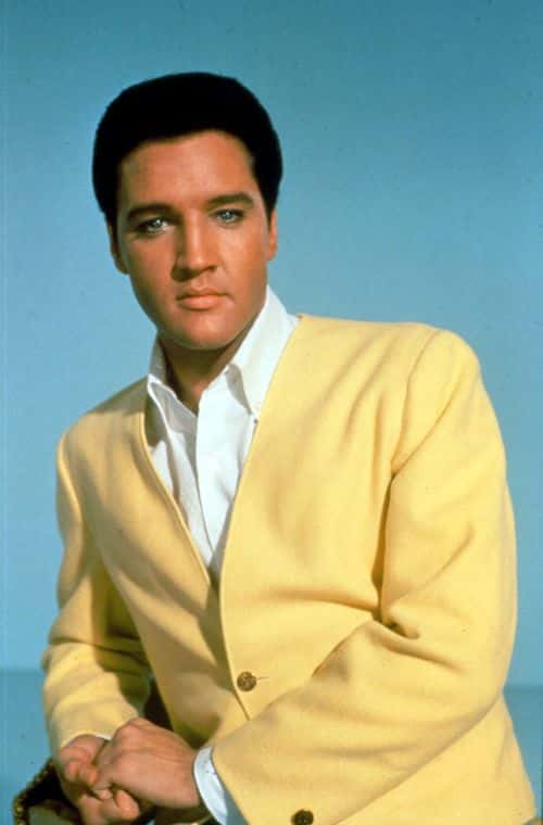 Singer Elvis Presley poses for a studio portrait.