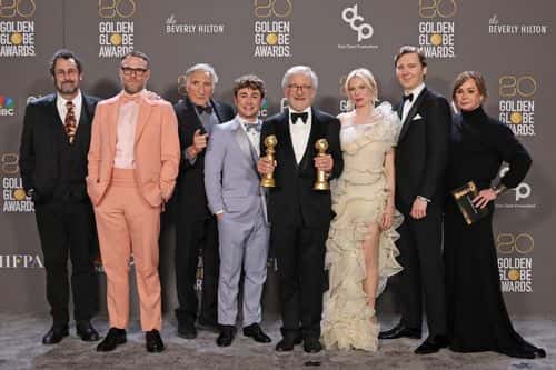 (L-R) Tony Kushner, Seth Rogen, Judd Hirsch, Gabriel LaBelle, Steven Spielberg, Michelle Williams, Paul Dano, and Kristie Macosko Krieger, winners of Best Picture - Drama for