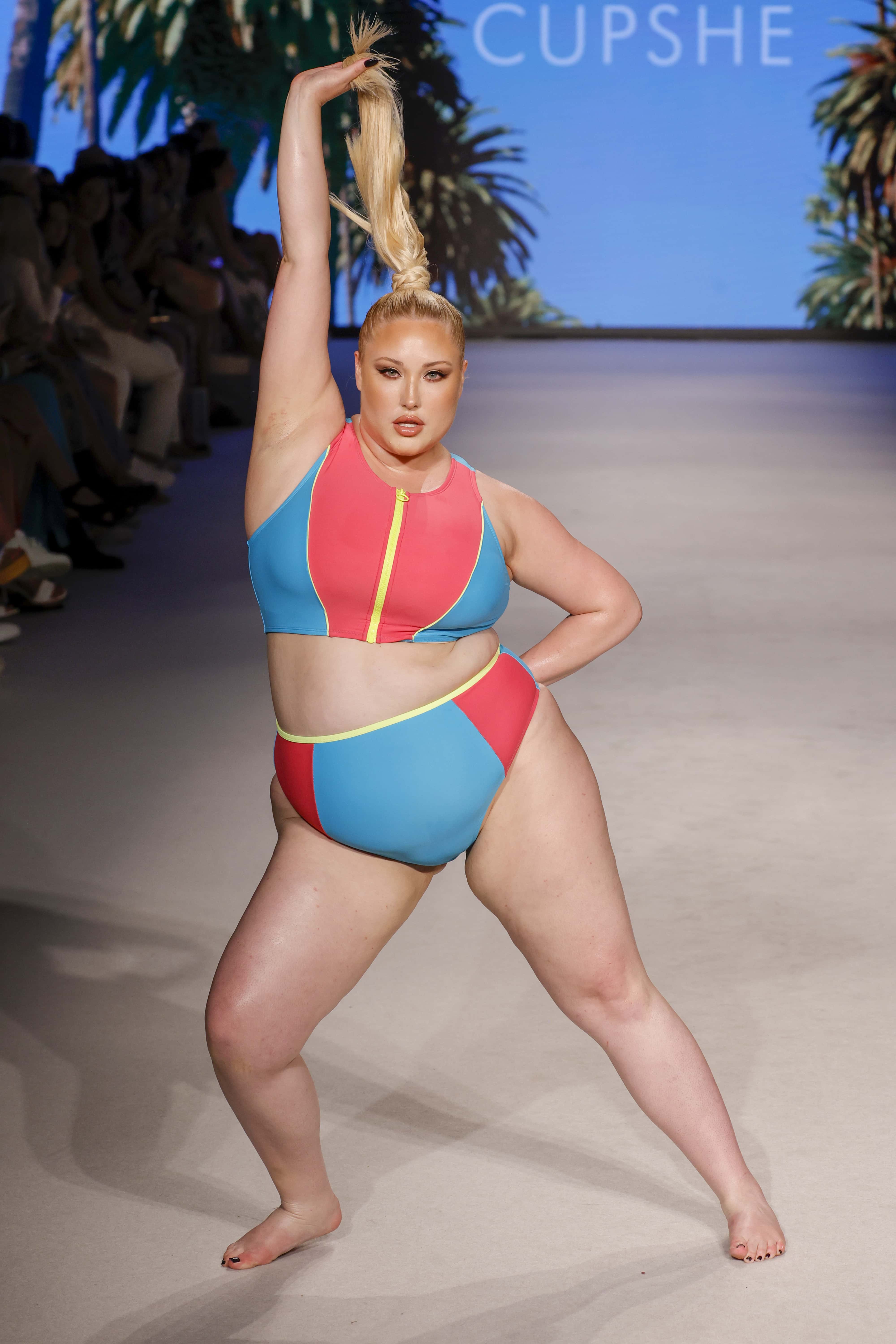 Hayley Hasselhoff wowed in a neon color block tankini and high-waisted bikini bottoms (Getty Images)