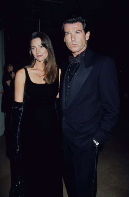 American journalist Keely Shaye Smith and her partner, Irish actor Pierce Brosnan attend the 10th Carousel of Hope Ball, held at the Beverly Hilton Hotel in Beverly Hills, California, 28th October 1994. The event is being held to benefit the Barbara Davis Center for Childhood Diabetes. (Photo by Vinnie Zuffante/Michael Ochs Archives/Getty Images)