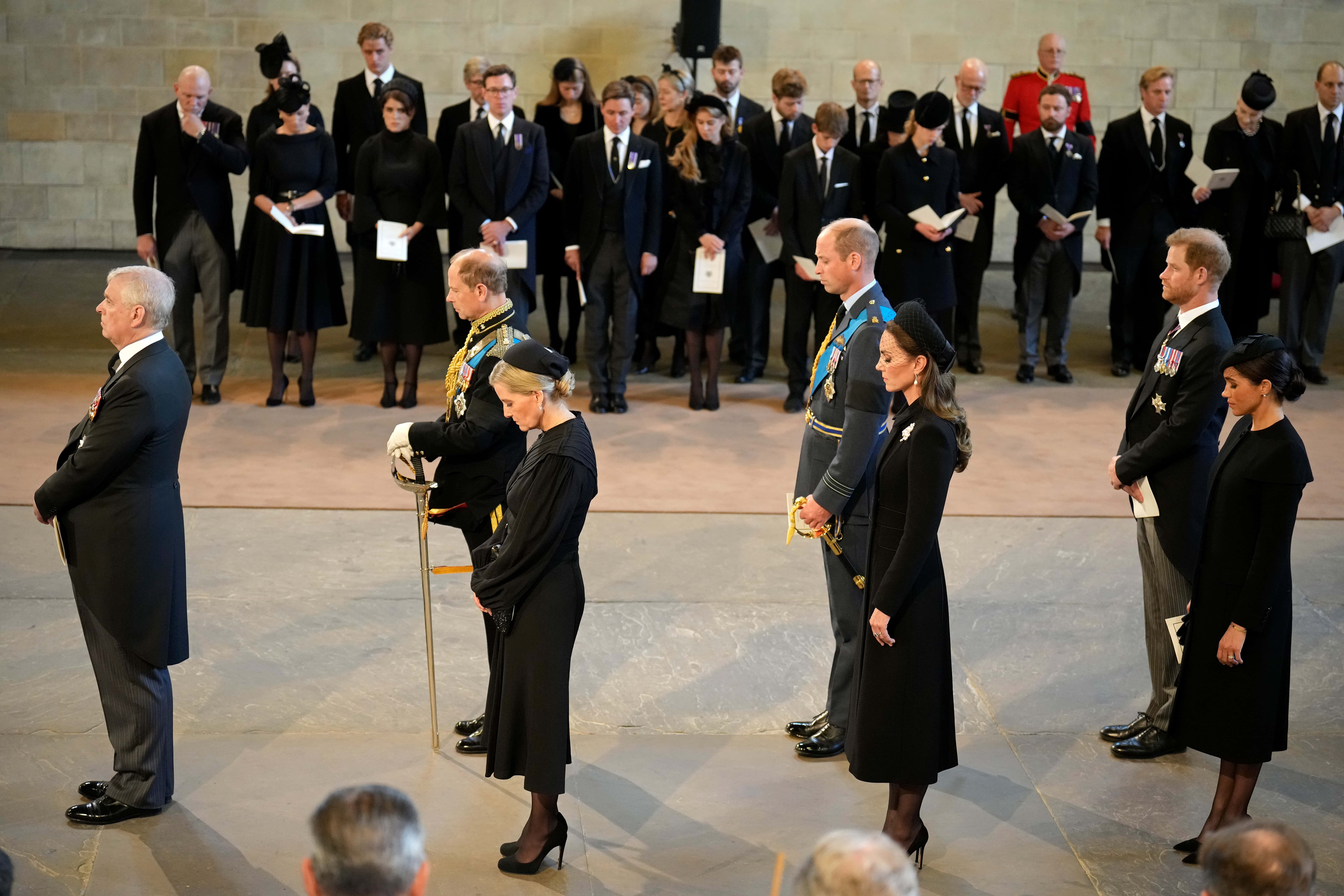 Prince Andrew, Duke of York, Prince Edward, Earl of Wessex, Sophie, Countess of Wessex, Prince William, Prince of Wales, Catherine, Princess of Wales, Prince Harry, Duke of Sussex and Meghan, Duchess of Sussex pay their respects inside the Palace of Westminster for the Lying-in State of Queen Elizabeth II on September 14, 2022 in London, England. Queen Elizabeth II's coffin is taken in procession on a Gun Carriage of The King's Troop Royal Horse Artillery from Buckingham Palace to Westminster Hall where she will lay in state until the early morning of her funeral. Queen Elizabeth II died at Balmoral Castle in Scotland on September 8, 2022, and is succeeded by her eldest son, King Charles III.
