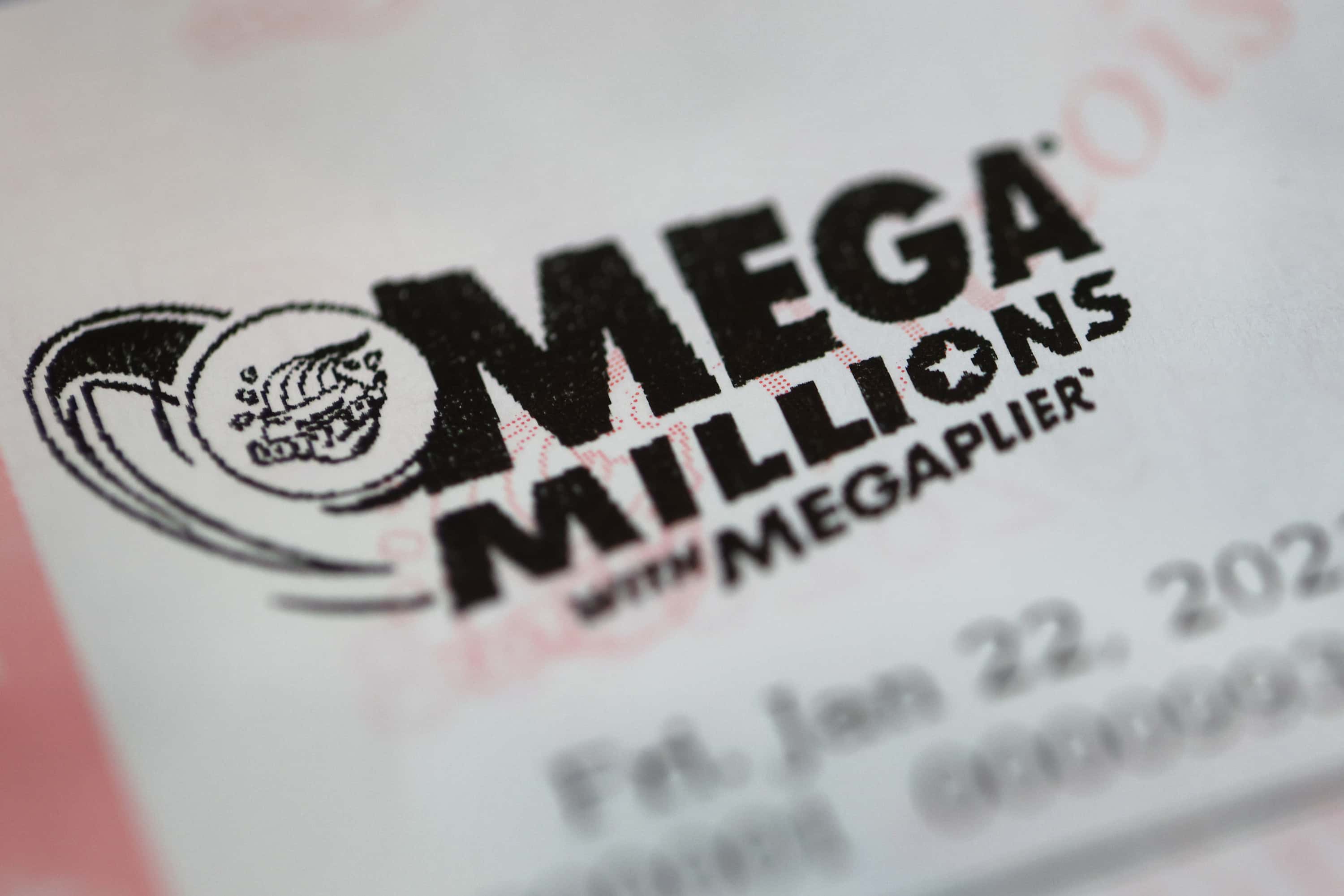 Mega Millions lottery tickets are sold at a 7-Eleven store in the Loop on January 22, 2021 in Chicago, Illinois. The jackpot in the drawing has climbed to $970 million, the third highest in the game's history.