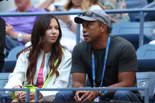 Erica Herman and Tiger Woods look on prior to the Women's Singles Second Round match  between Anett Kontaveit of Estonia and Serena Williams of the United States on Day Three of the 2022 US Open at USTA Billie Jean King National Tennis Center on August 31, 2022 in the Flushing neighborhood of the Queens borough of New York City.