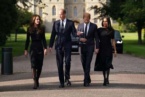 Catherine, Princess of Wales, Prince William, Prince of Wales, Prince Harry, Duke of Sussex, and Meghan, Duchess of Sussex on the long Walk at Windsor Castle on September 10, 2022 in Windsor, England. Crowds have gathered and tributes left at the gates of Windsor Castle to Queen Elizabeth II, who died at Balmoral Castle on 8 September, 2022.