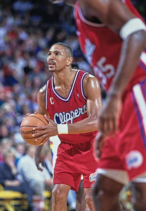 Mark Jackson #13, Point Guard for the Los Angeles Clippers prepares to make a free throw during the NBA Midwest Division basketball game against the Denver Nuggets on 28th November 1992 at the McNichols Sports Arena, Denver, Colorado, United States. The Clippers won the game 121 - 119.  (Photo by Tim DeFrisco/Allsport/Getty Images)