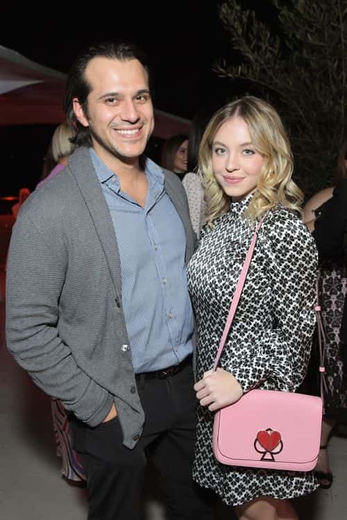 Jonathan Davino (L) and Sydney Sweeney attend the InStyle and Kate Spade dinner at Spring Place on October 23, 2018 in Los Angeles, California.