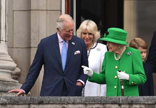 Prince Charles, Prince of Wales, Camilla, Duchess of Cornwall and Queen Elizabeth II stand on the balcony during the Platinum Pageant on June 05, 2022 in London, England. The Platinum Jubilee of Elizabeth II is being celebrated from June 2 to June 5, 2022, in the UK and Commonwealth to mark the 70th anniversary of the accession of Queen Elizabeth II on 6 February 1952.