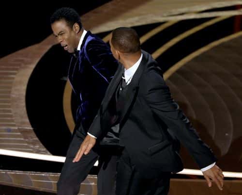 Will Smith appears to slap Chris Rock onstage during the 94th Annual Academy Awards at Dolby Theatre on March 27, 2022 in Hollywood, California.