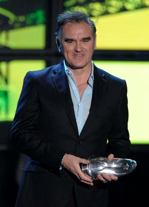 Singer/songwriter Morrissey accepts an award onstage at the 