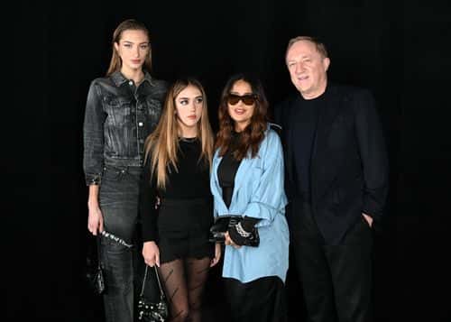 (L-R) Mathilde Pinault, Valentina Paloma Pinault, Salma Hayek, and François-Henri Pinault attend the Balenciaga FW 22 show at Le Bourget Halle d ‘Expositions on March 06, 2022 in Le Bourget, France.