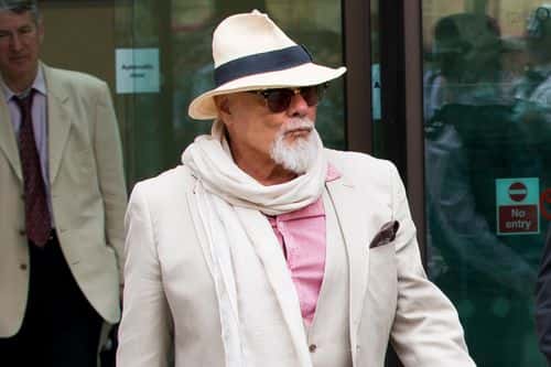 Gary Glitter departs court after facing charges of sexual offences at The City of Westminster Magistrates Court on June 19, 2014 in London, England.